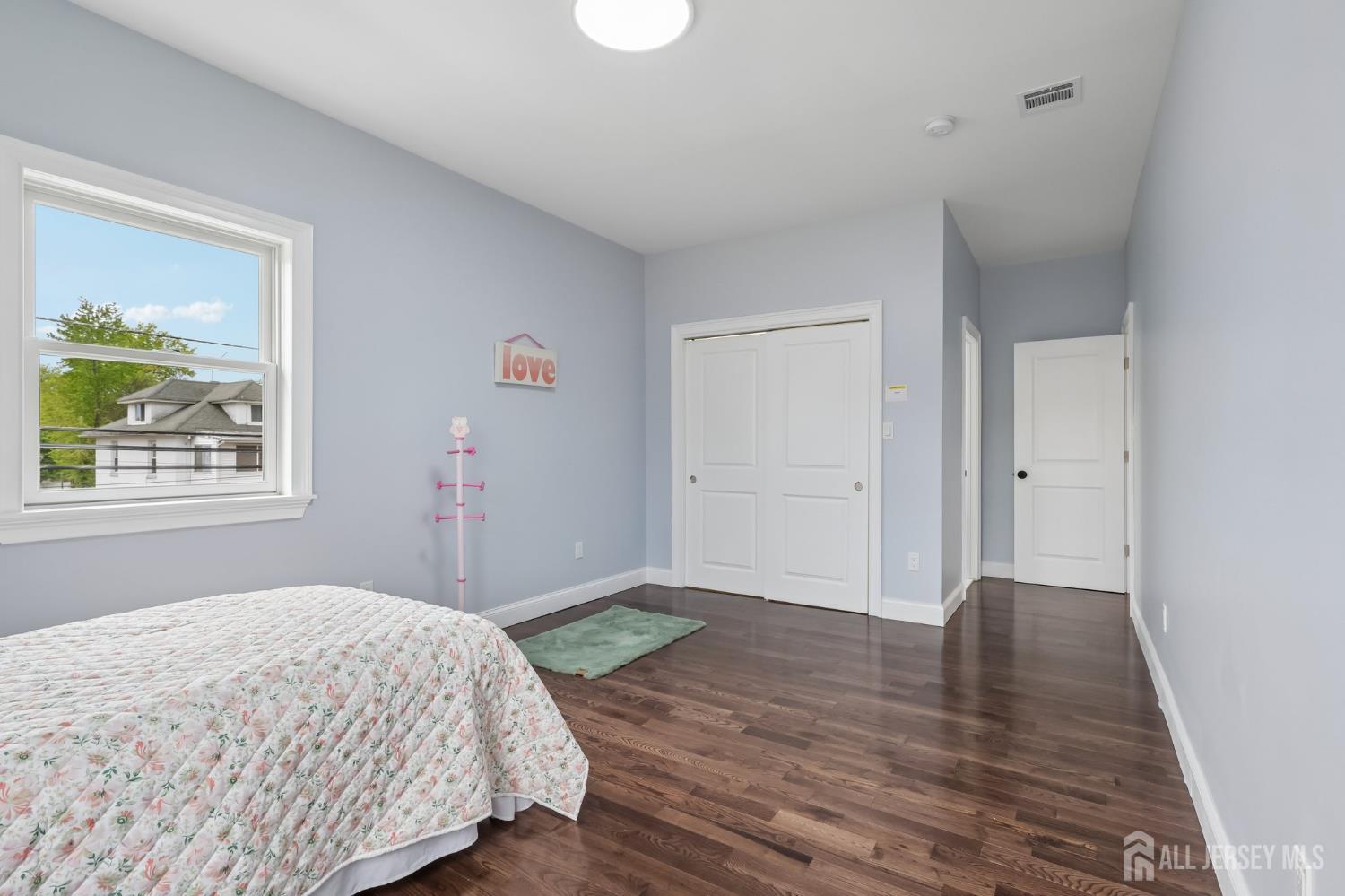 239 Suttons Lane Edison, NJ 08817 - Photo 62 of 68 a view of livingroom with wooden floor