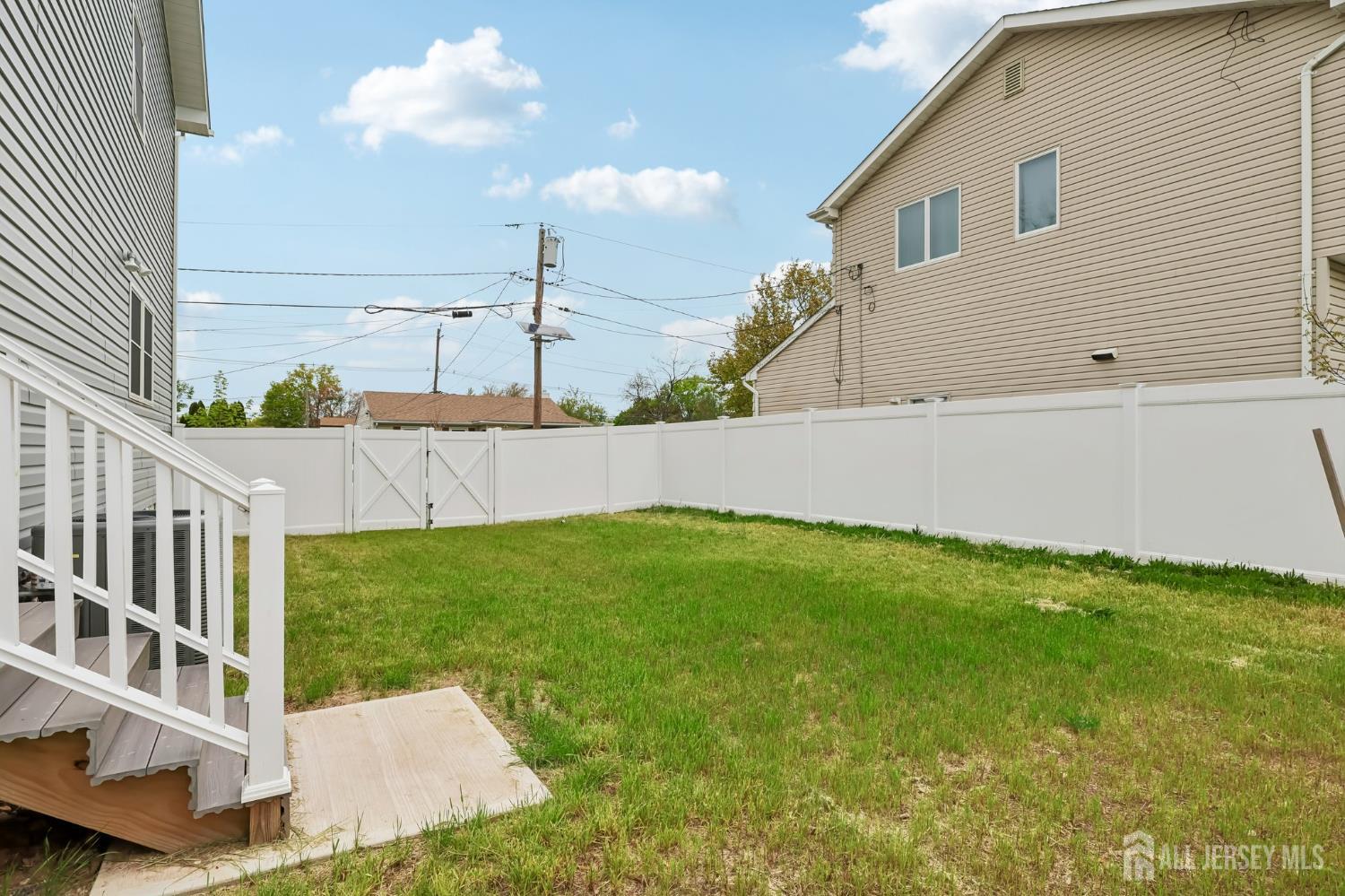 239 Suttons Lane Edison, NJ 08817 - Photo 68 of 68 a view of backyard with deck