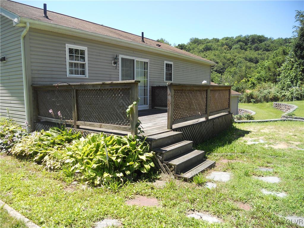 568 Allegheny Road Mount Bethel, PA 18343 - Photo 28 of 36 A deck off the back of the home