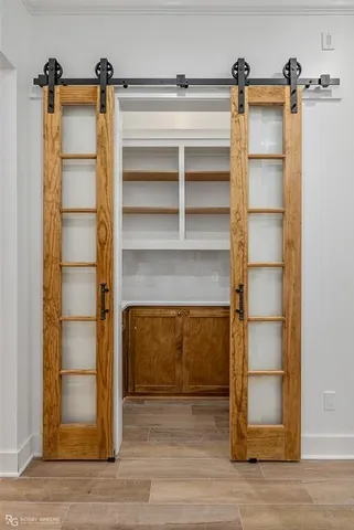 a view of a room with storage and utility room