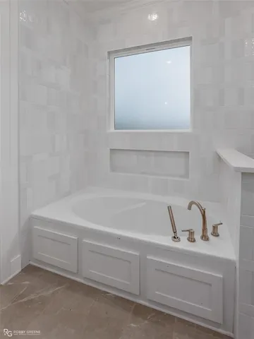 a bathroom with a bathtub