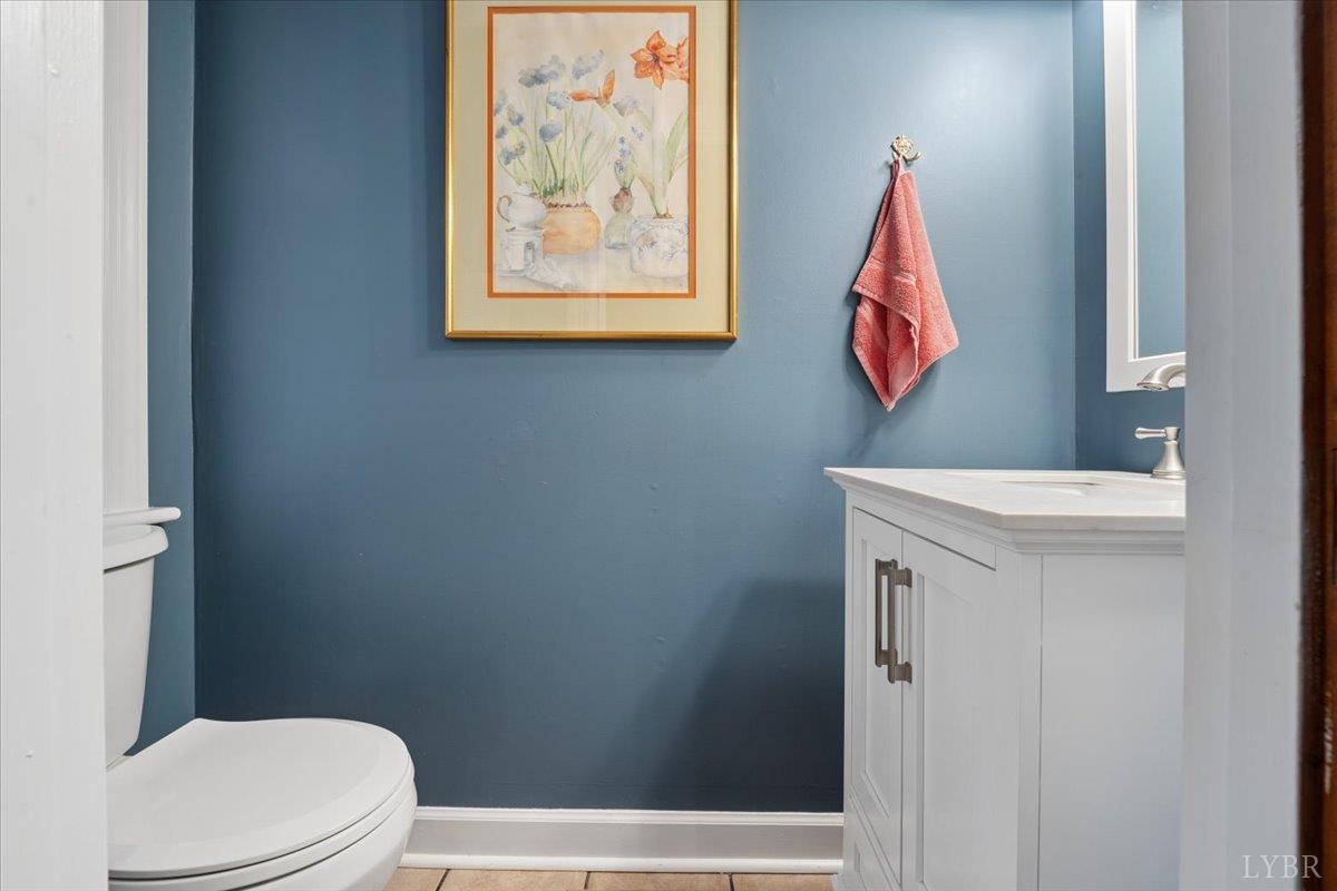 3289 Peaks Road Bedford, VA 24523 - Photo 13 of 71 a bathroom with a toilet and a sink