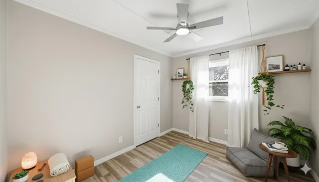 a view of room with window and hardwood floor