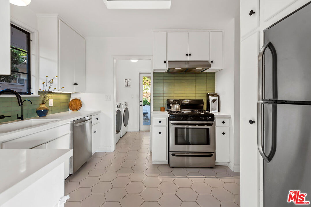 356 Cherry Drive Pasadena, CA 91105 - Photo 12 of 23 a kitchen with stainless steel appliances granite countertop a refrigerator and a stove
