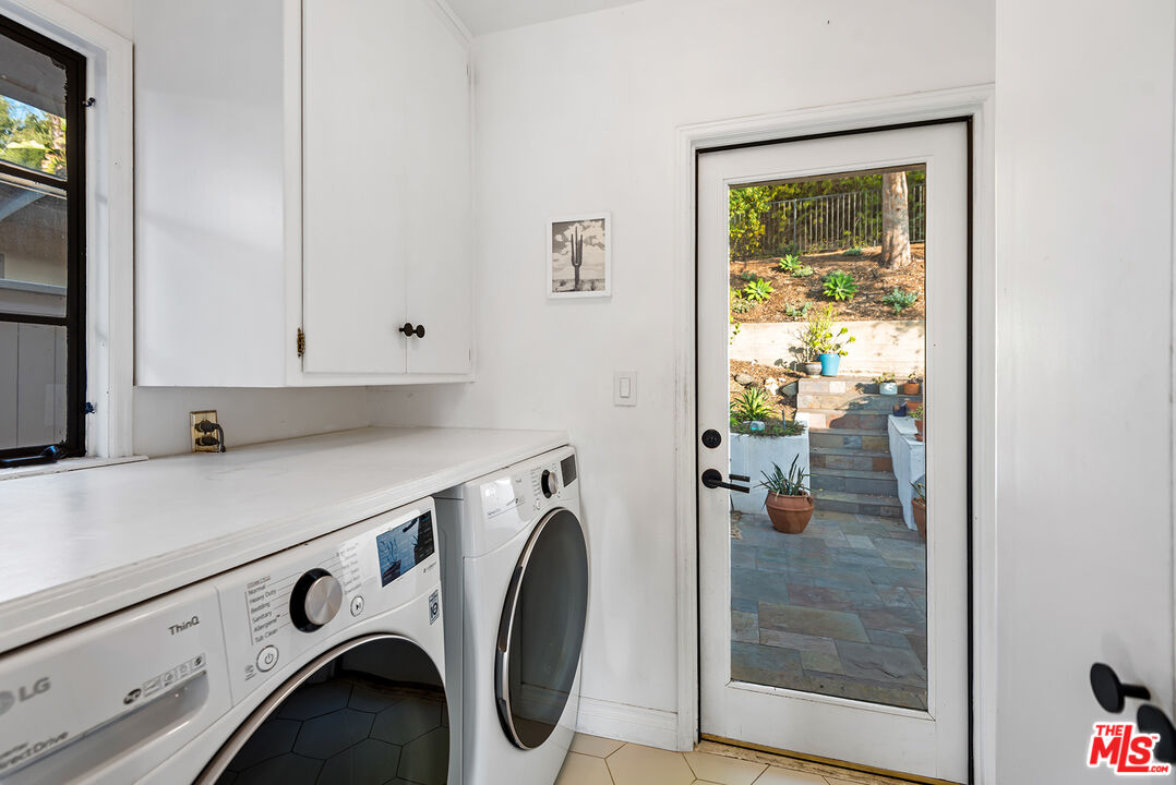 356 Cherry Drive Pasadena, CA 91105 - Photo 13 of 23 a utility room with dryer and washer