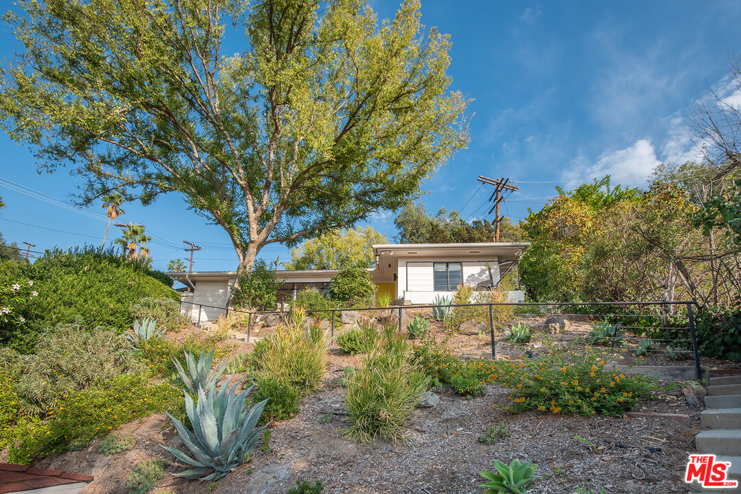 356 Cherry Drive Pasadena, CA 91105 - Photo 22 of 23 a view of a house with a yard