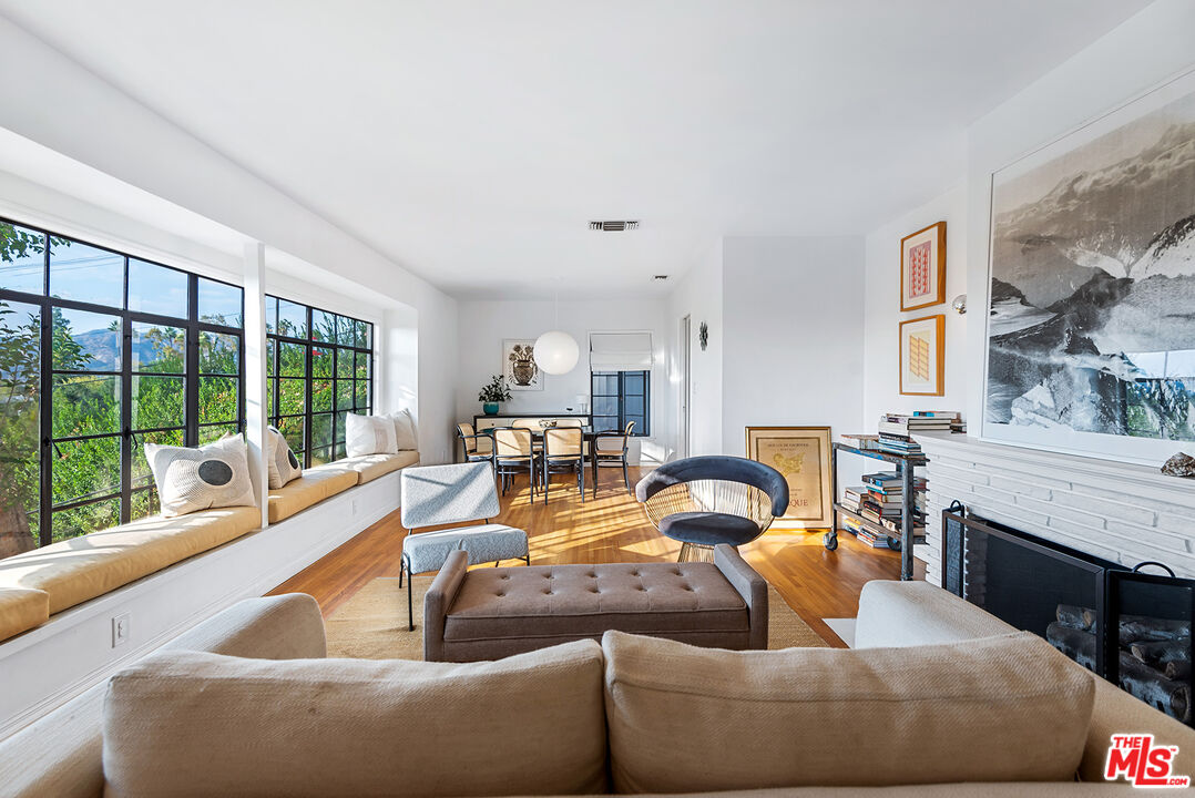 356 Cherry Drive Pasadena, CA 91105 - Photo 3 of 23 a living room with furniture fireplace and a large window