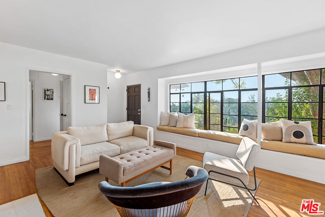 356 Cherry Drive Pasadena, CA 91105 - Photo 5 of 23 a living room with furniture and a large window