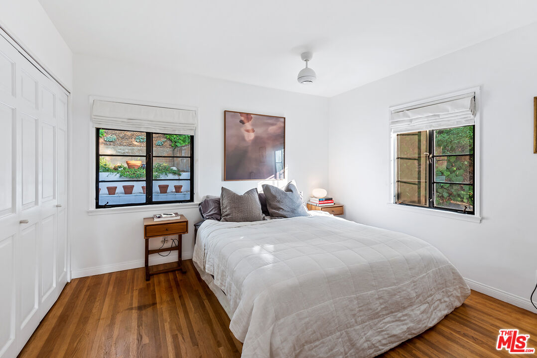 356 Cherry Drive Pasadena, CA 91105 - Photo 10 of 23 a bedroom with a bed and a window