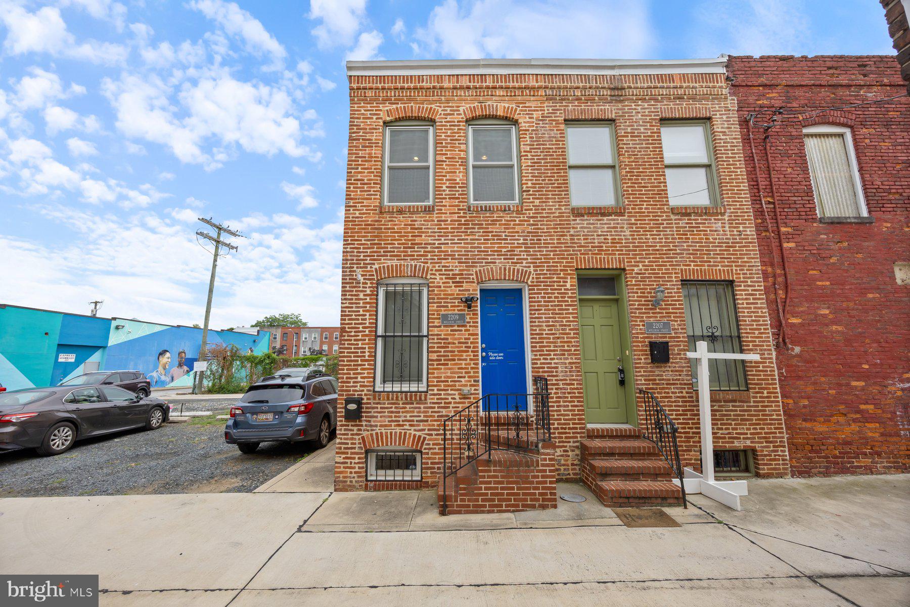 a car parked in front of a building