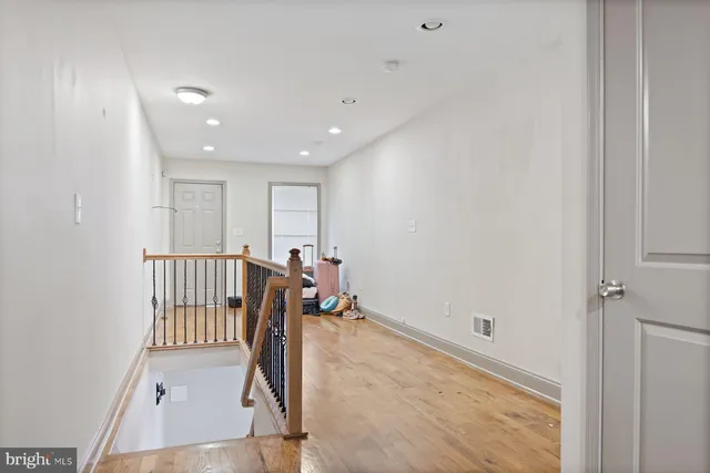 a kitchen with a sink stove and microwave