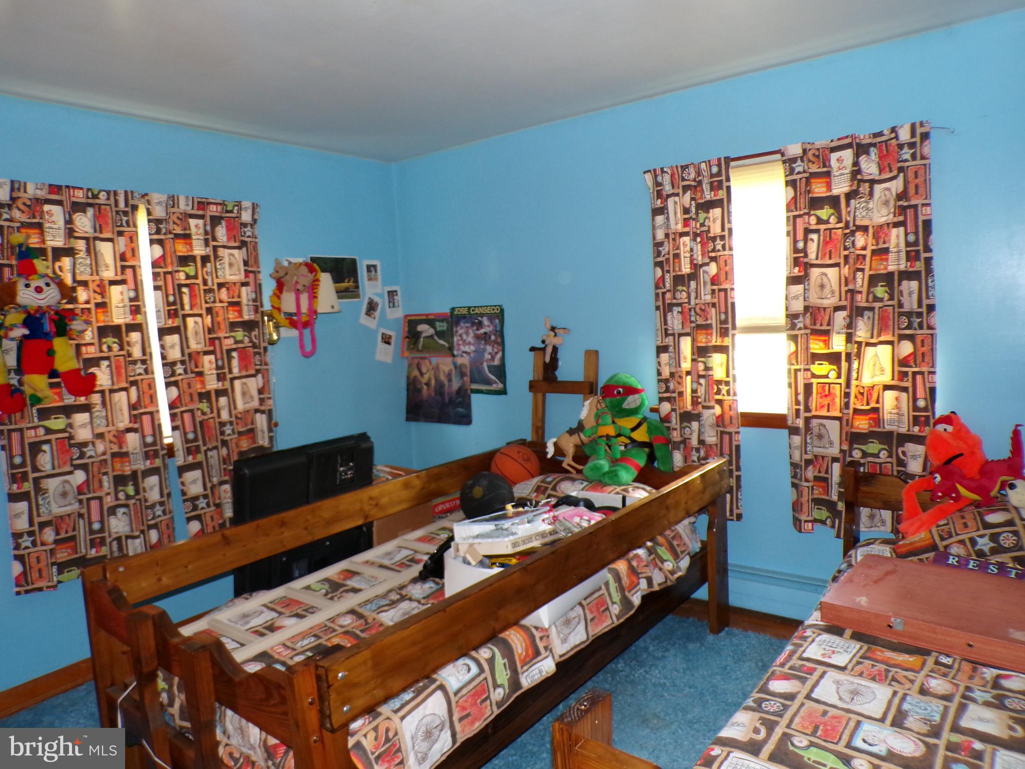 2713 Rowe Road New Windsor, MD 21776 - Photo 13 of 67 a bed room with furniture and a window