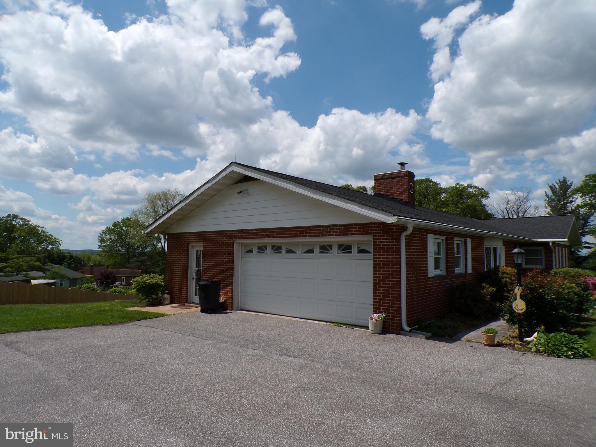 2713 Rowe Road New Windsor, MD 21776 - Photo 26 of 67 a front view of house with yard and green space