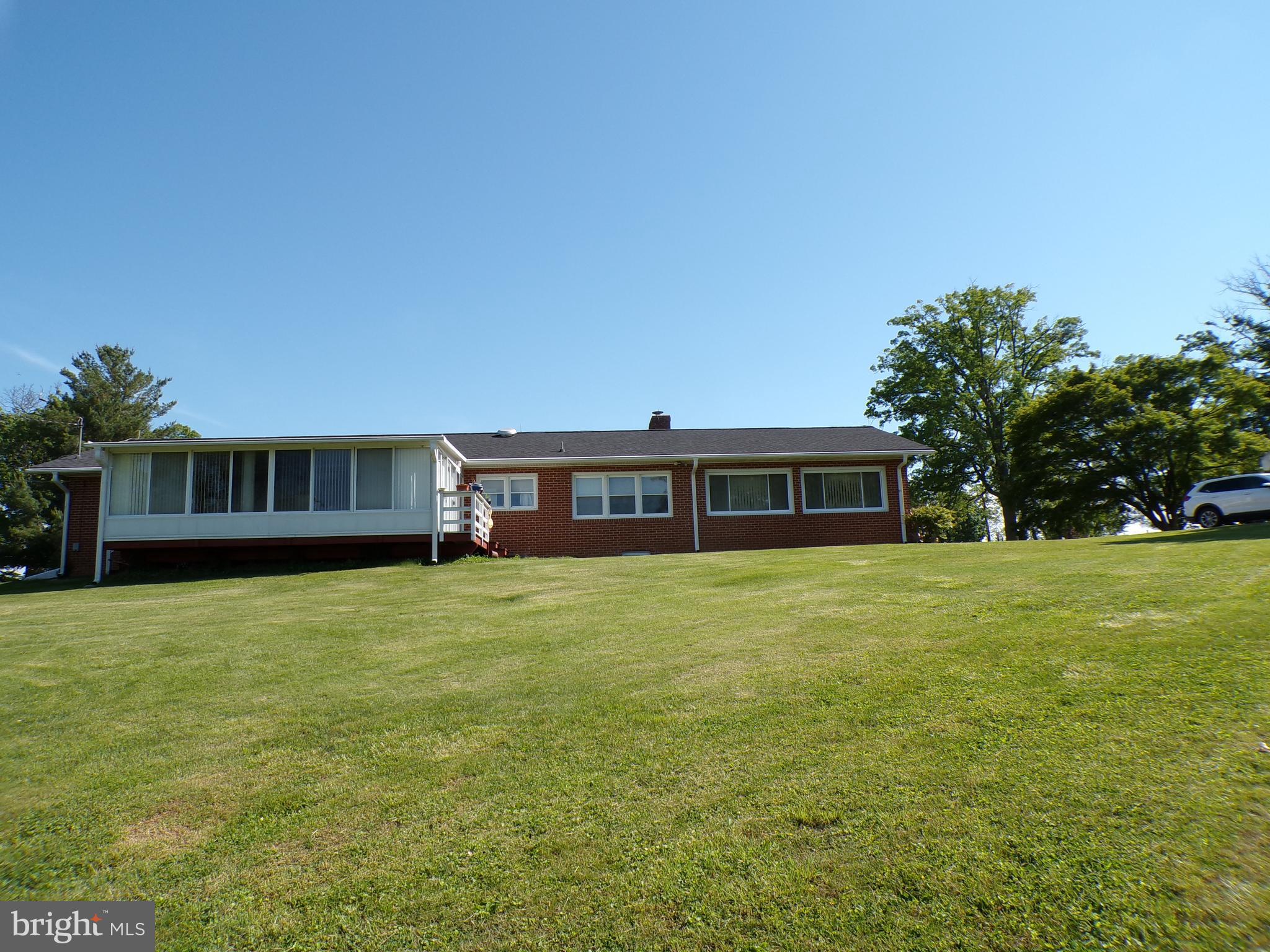 2713 Rowe Road New Windsor, MD 21776 - Photo 29 of 67 a front view of a house with garden