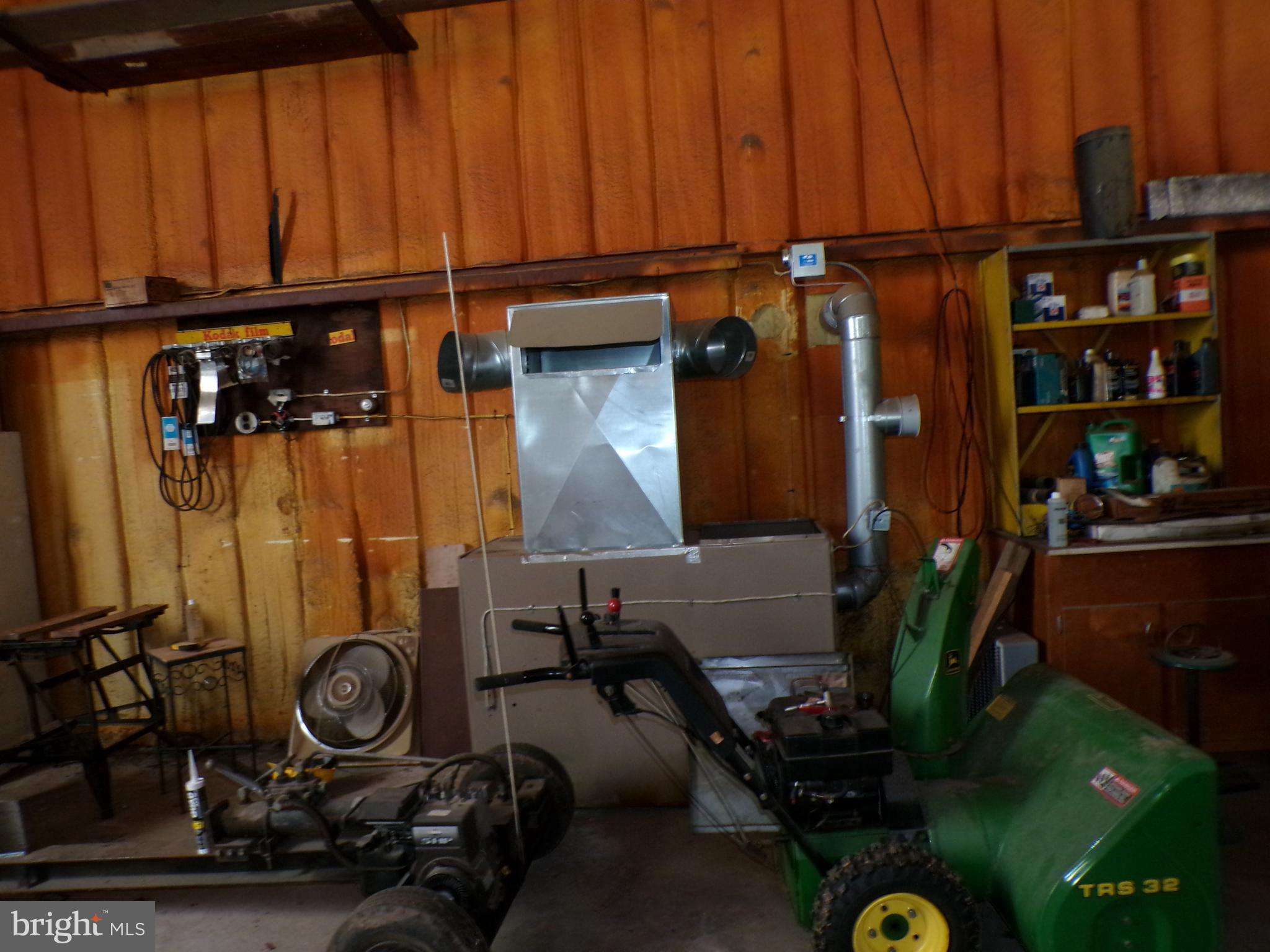 2713 Rowe Road New Windsor, MD 21776 - Photo 38 of 67 a view of a room with gym equipment