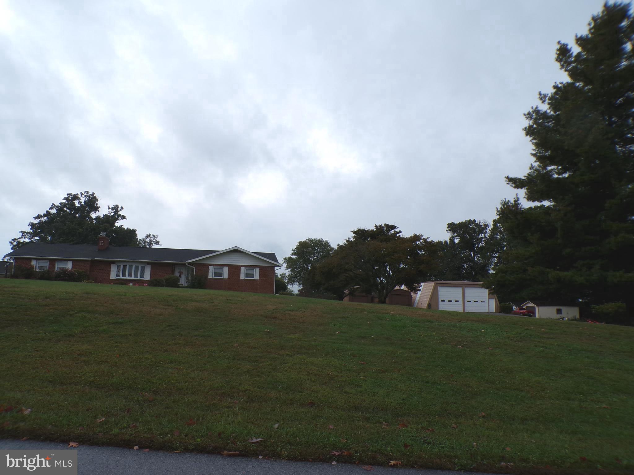 2713 Rowe Road New Windsor, MD 21776 - Photo 52 of 67 a view of a city from a lake
