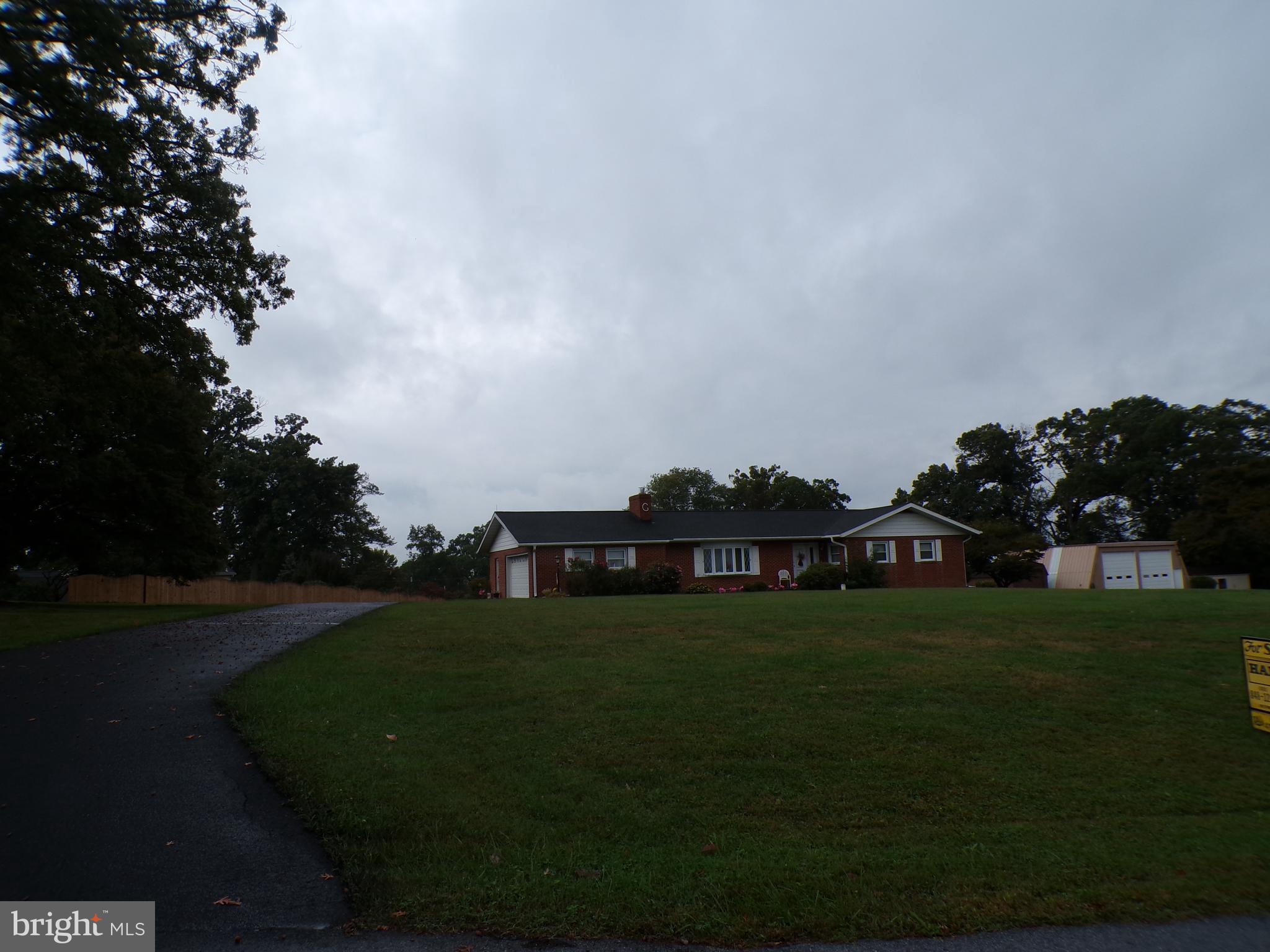 2713 Rowe Road New Windsor, MD 21776 - Photo 55 of 67 a view of a golf course with a lake