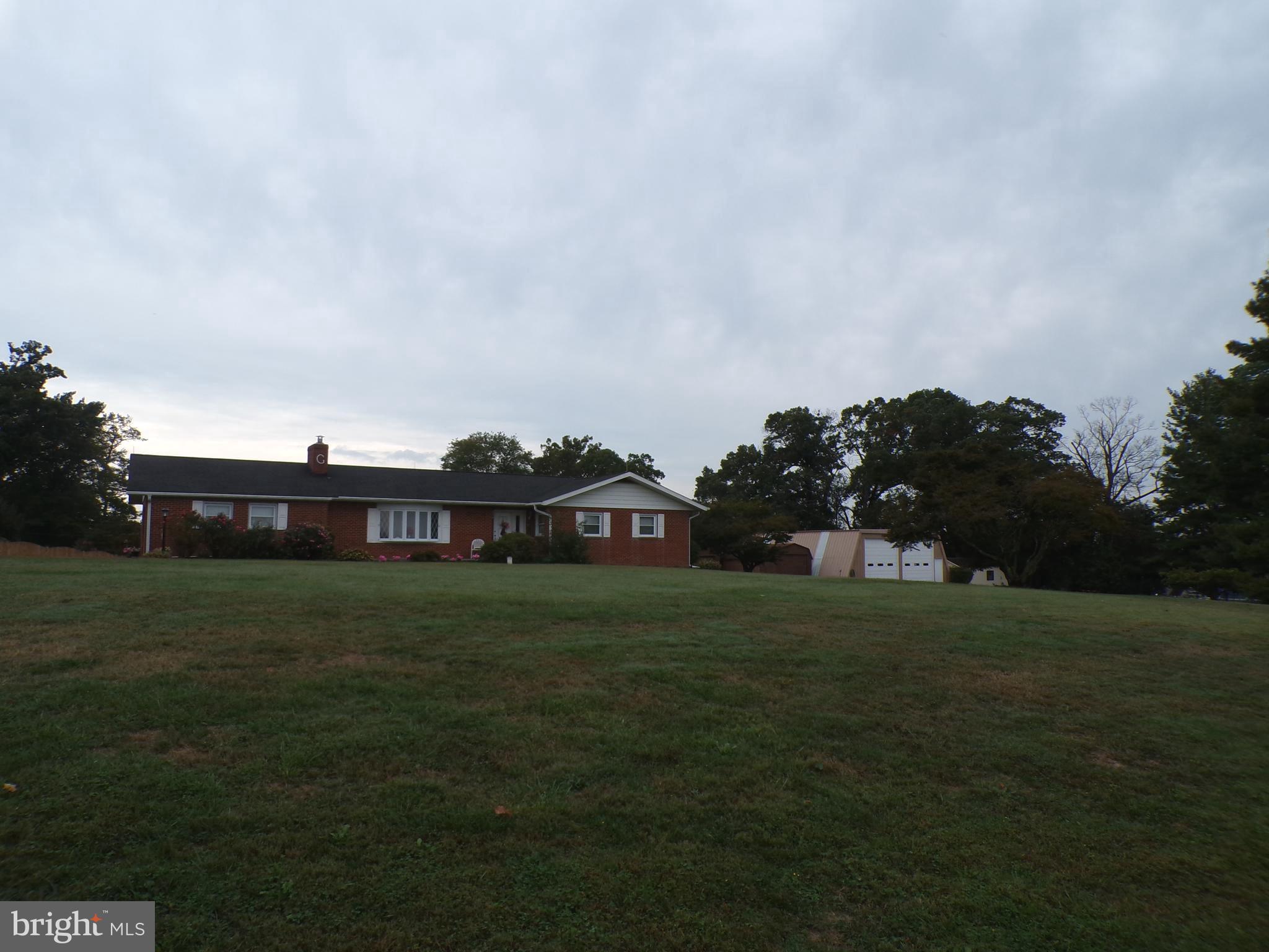 2713 Rowe Road New Windsor, MD 21776 - Photo 58 of 67 a view of a big yard with a house