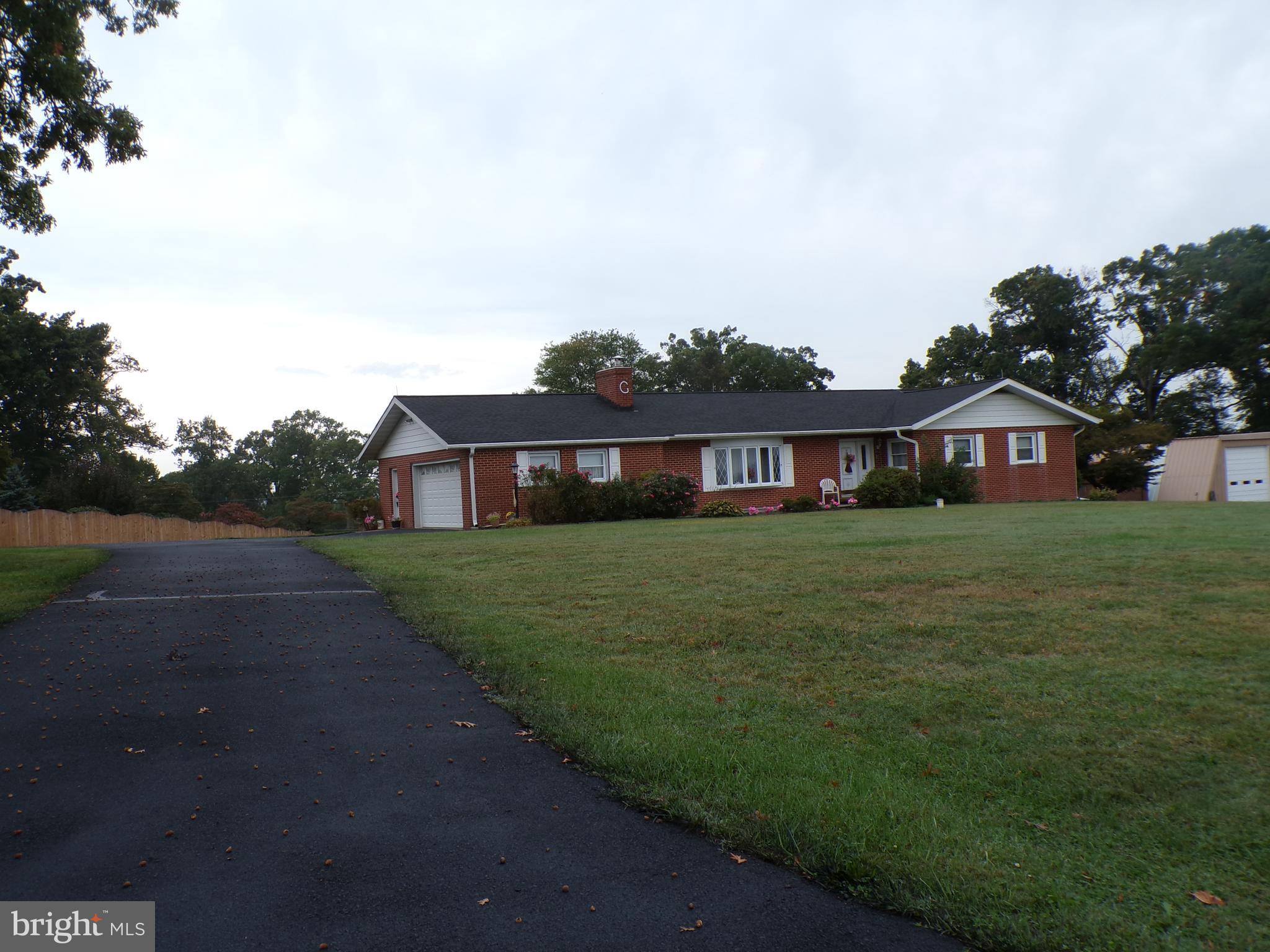 2713 Rowe Road New Windsor, MD 21776 - Photo 60 of 67 a front view of house with yard and green space