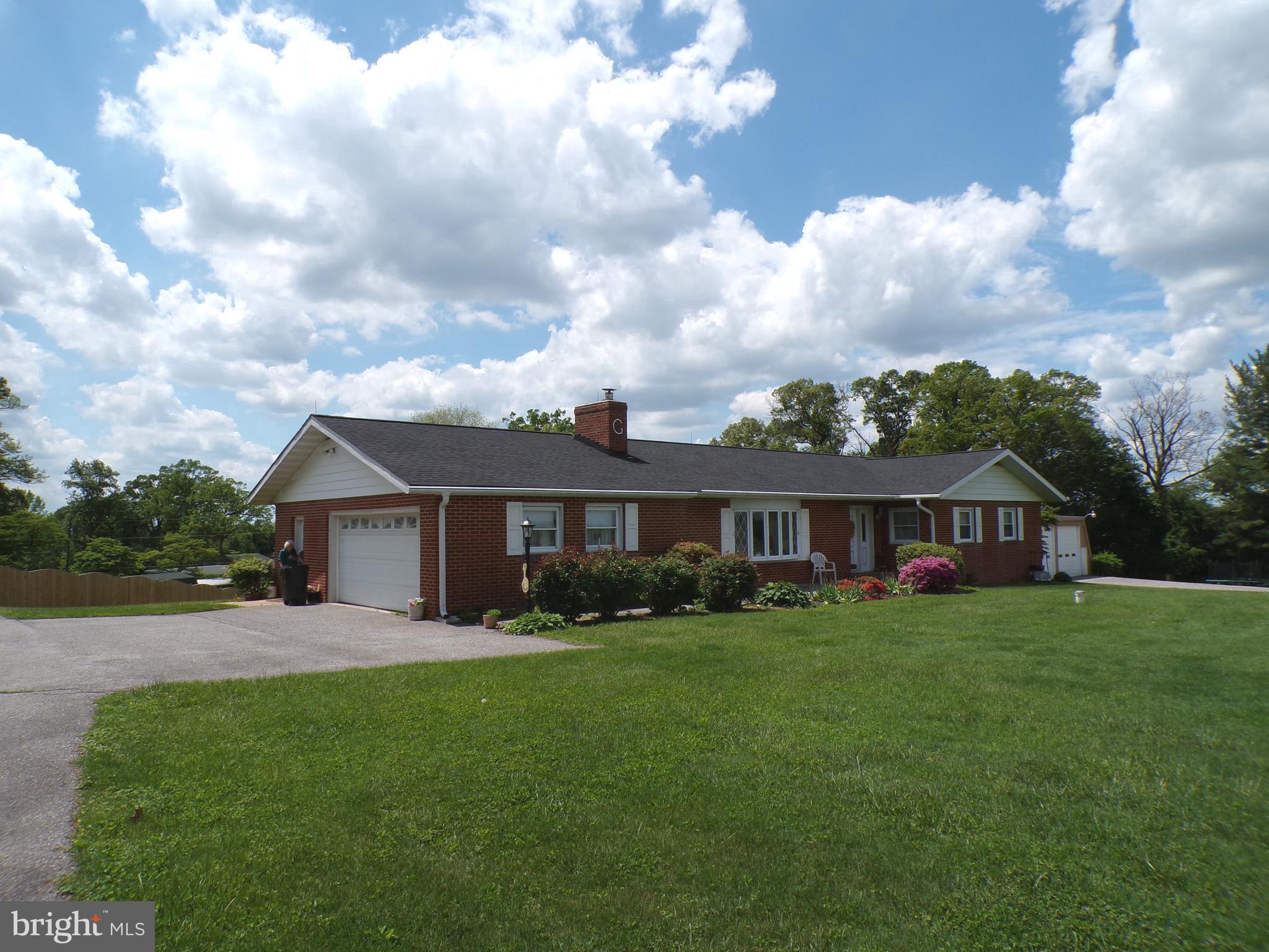 2713 Rowe Road New Windsor, MD 21776 - Photo 6 of 67 front view of a house with a yard