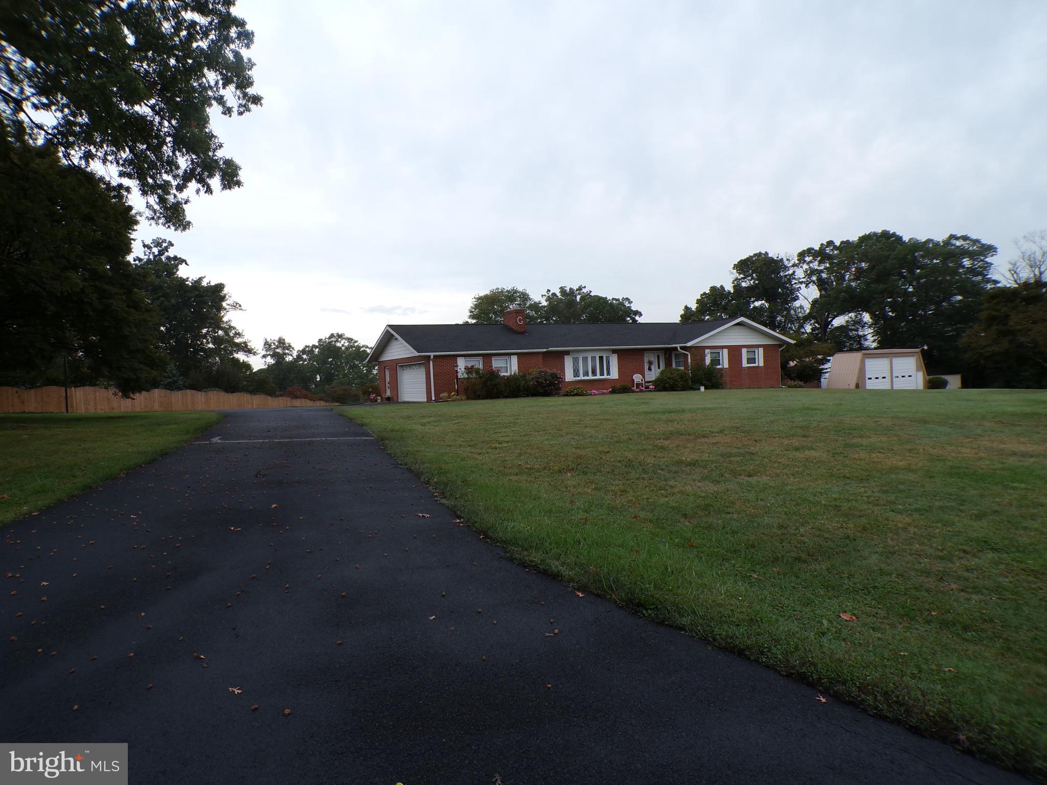 2713 Rowe Road New Windsor, MD 21776 - Photo 61 of 67 a view of a street with houses on both side of it