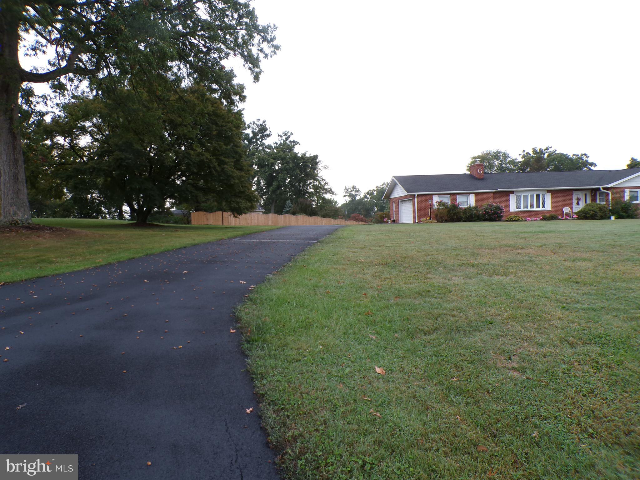 2713 Rowe Road New Windsor, MD 21776 - Photo 62 of 67 a view of a house with a yard