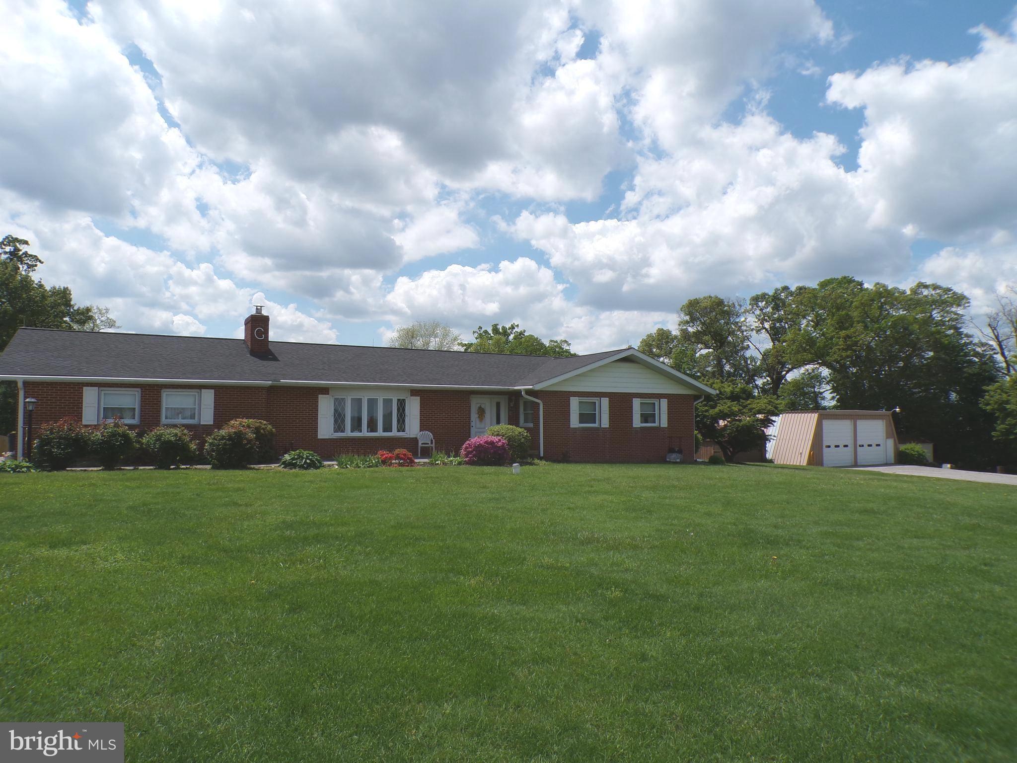 2713 Rowe Road New Windsor, MD 21776 - Photo 7 of 67 a view of a yard in front of a house