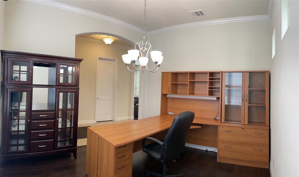 8031 Sunflower Lane Dallas, TX 75252 - Photo 11 of 34 a view of a dining room with furniture and wooden floor
