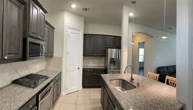 a view of a bathroom with a glass door