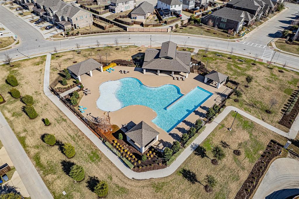 8031 Sunflower Lane Dallas, TX 75252 - Photo 3 of 34 an aerial view of a swimming pool