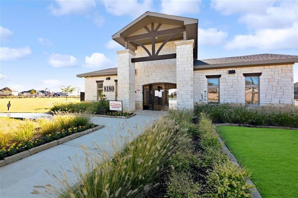 8031 Sunflower Lane Dallas, TX 75252 - Photo 4 of 34 a front view of a house with garden