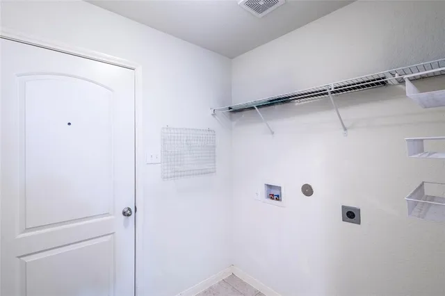 a view of backyard with a garden and trees