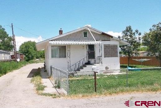 Vintage farmhouse on 1 acre w/irrigation, pump & gated pipes.