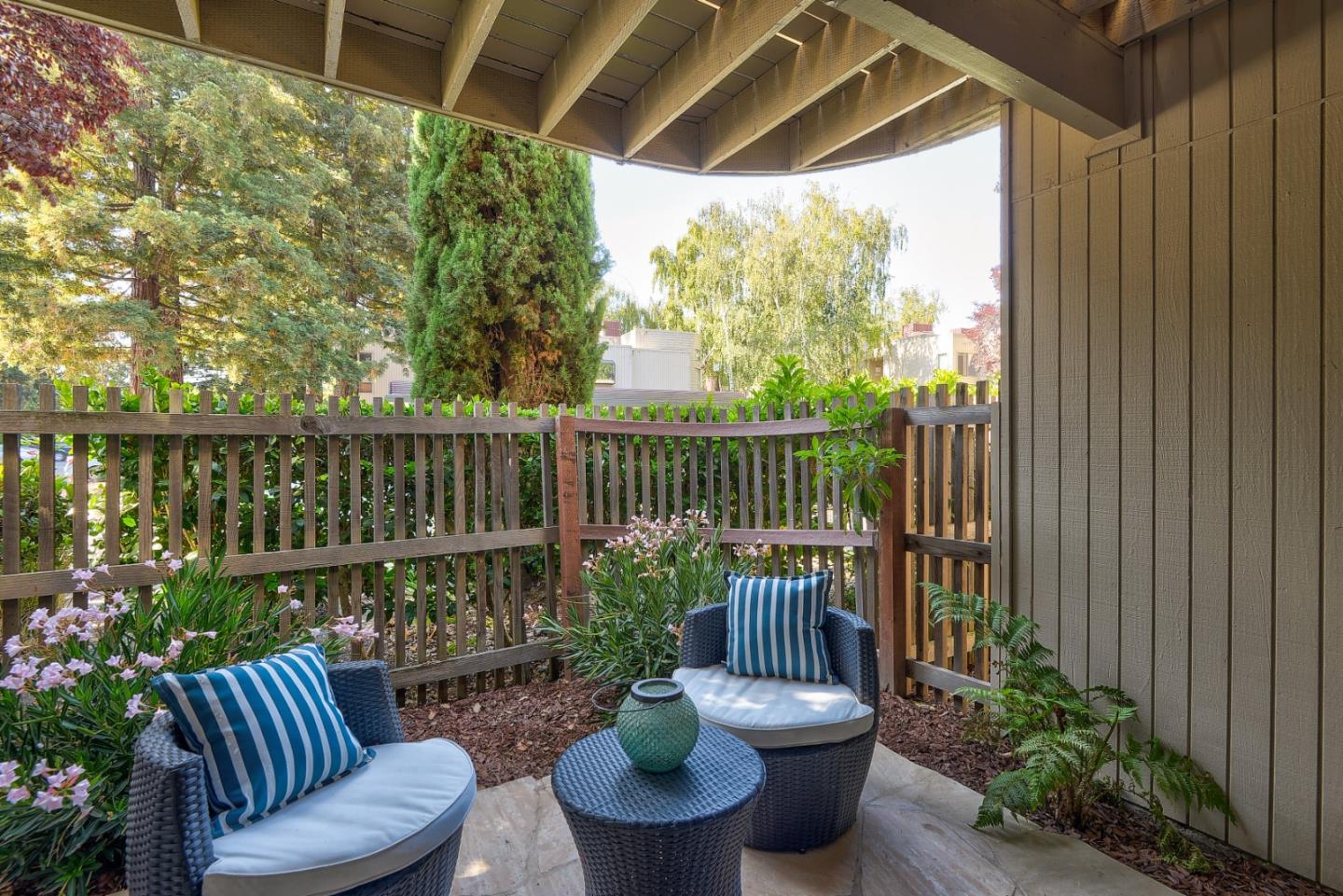928 Wright Avenue, Unit 401 Mountain View, CA 94043 - Photo 17 of 18 a view of a chair and table in the balcony