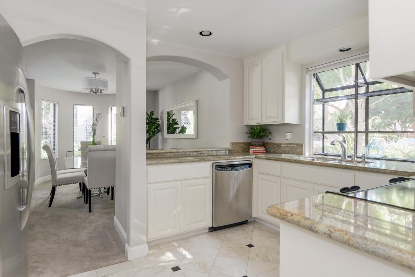928 Wright Avenue, Unit 401 Mountain View, CA 94043 - Photo 3 of 18 a kitchen with sink and cabinets
