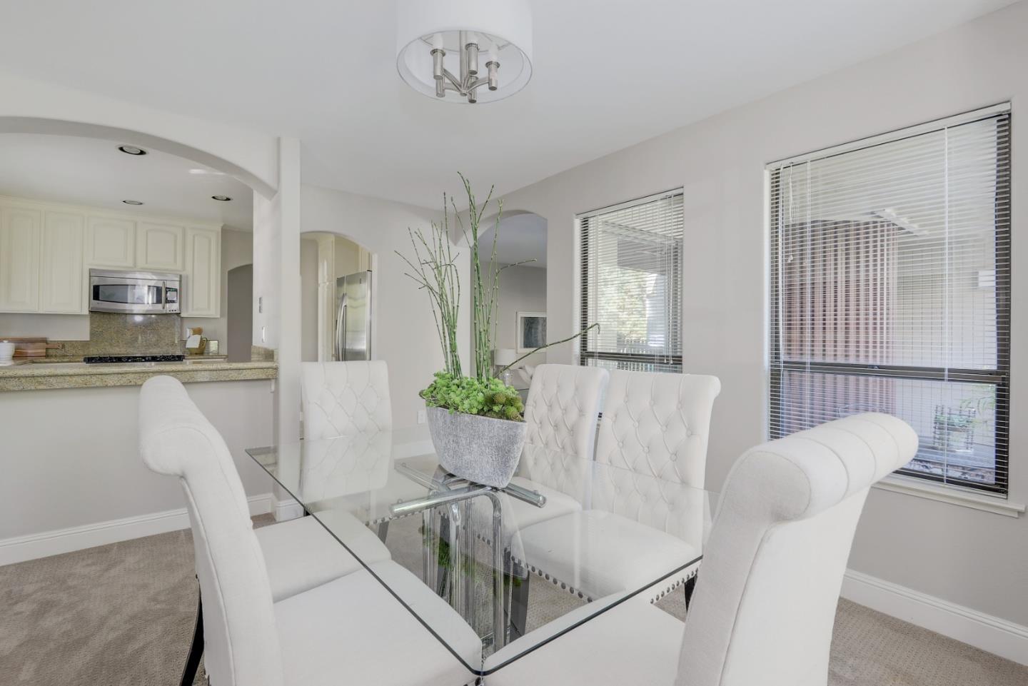 928 Wright Avenue, Unit 401 Mountain View, CA 94043 - Photo 7 of 18 a living room with furniture and wooden floor