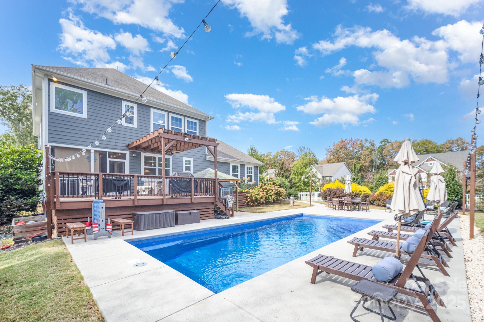 1556 Prickly Lane Waxhaw, NC 28173 - Photo 2 of 39 a view of a house with swimming pool