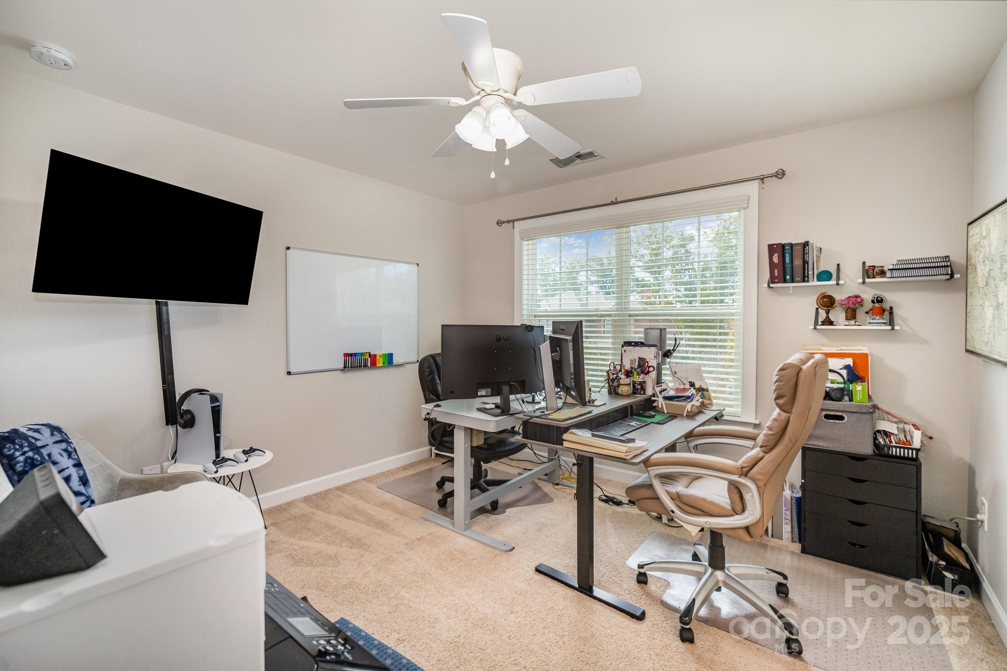 1556 Prickly Lane Waxhaw, NC 28173 - Photo 29 of 39 a view of a workspace with furniture and a window