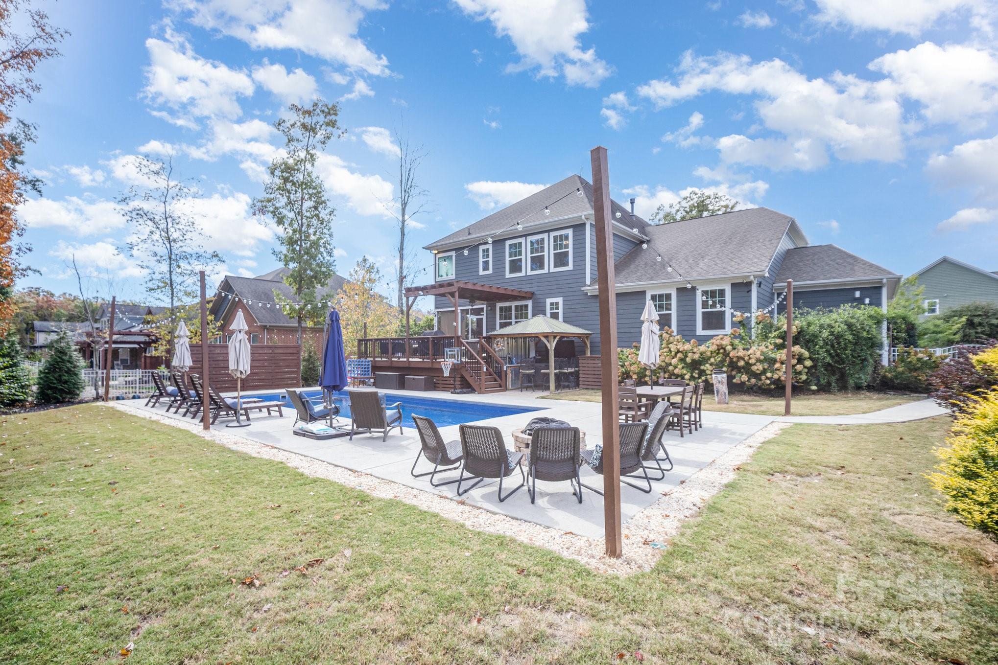 1556 Prickly Lane Waxhaw, NC 28173 - Photo 36 of 39 a view of a house with swimming pool and sitting area