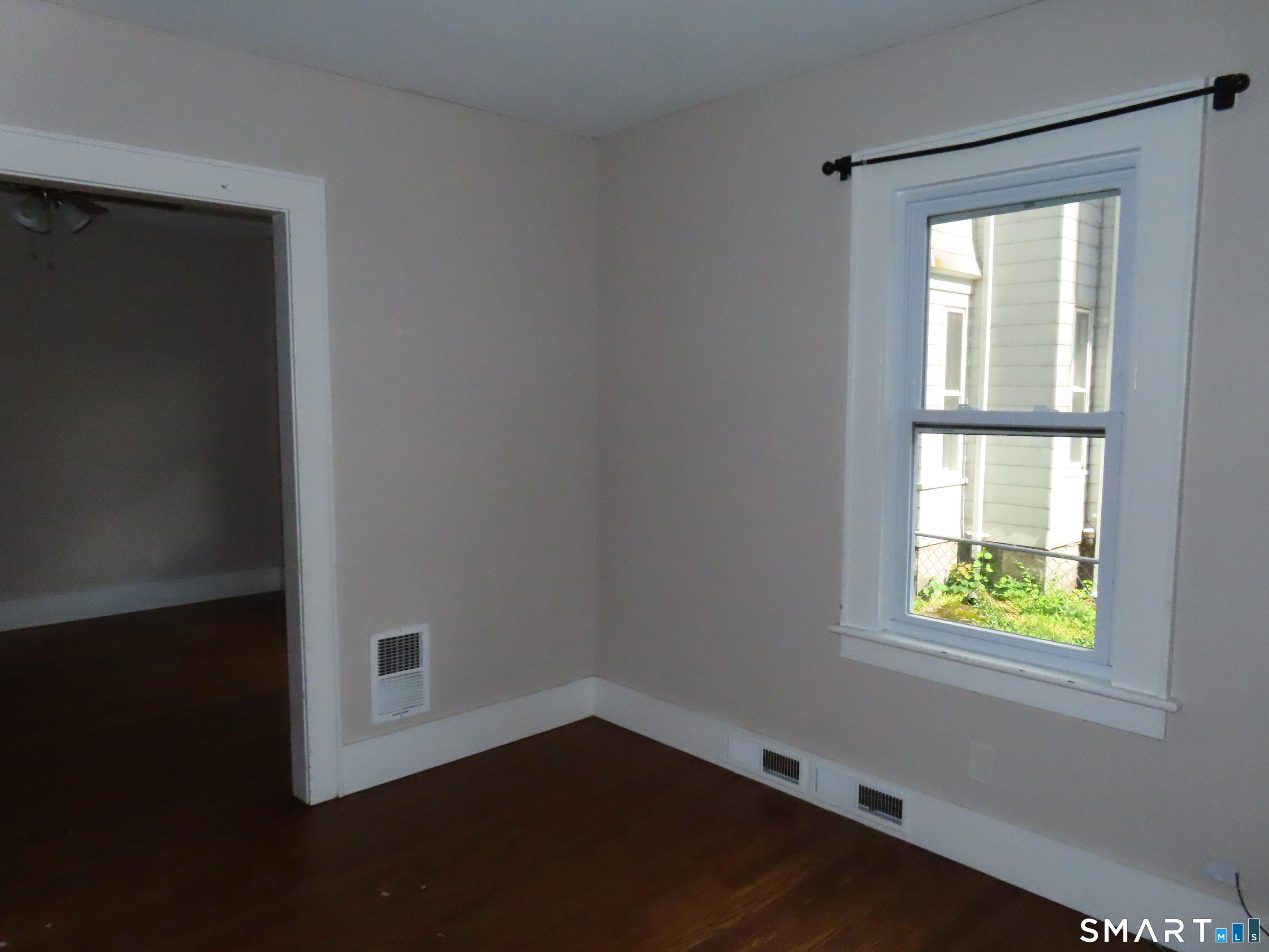 38 Winter Street Ansonia, CT 06401 - Photo 7 of 13 an empty room with a window