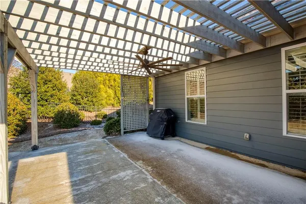 a aerial view of a house with a yard