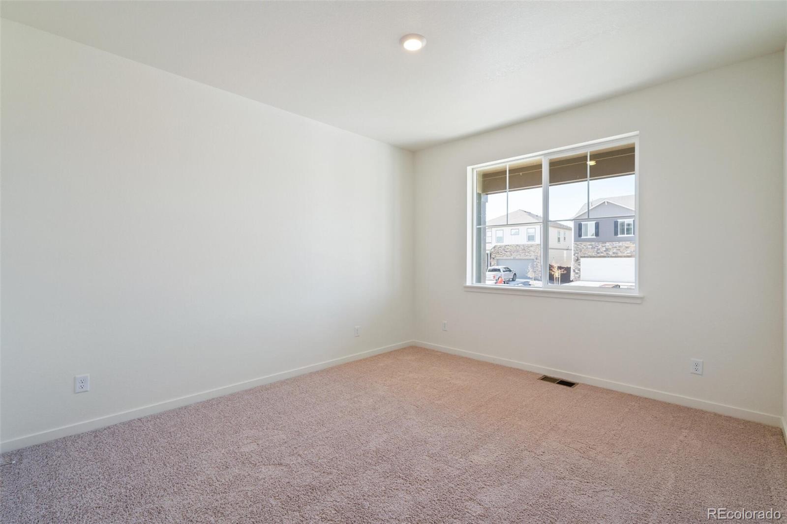 6020 Amerifax Drive Windsor, CO 80528 - Photo 9 of 16 an empty room with a window