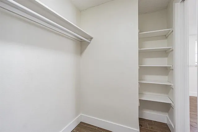 a view of a room with racks on the wall