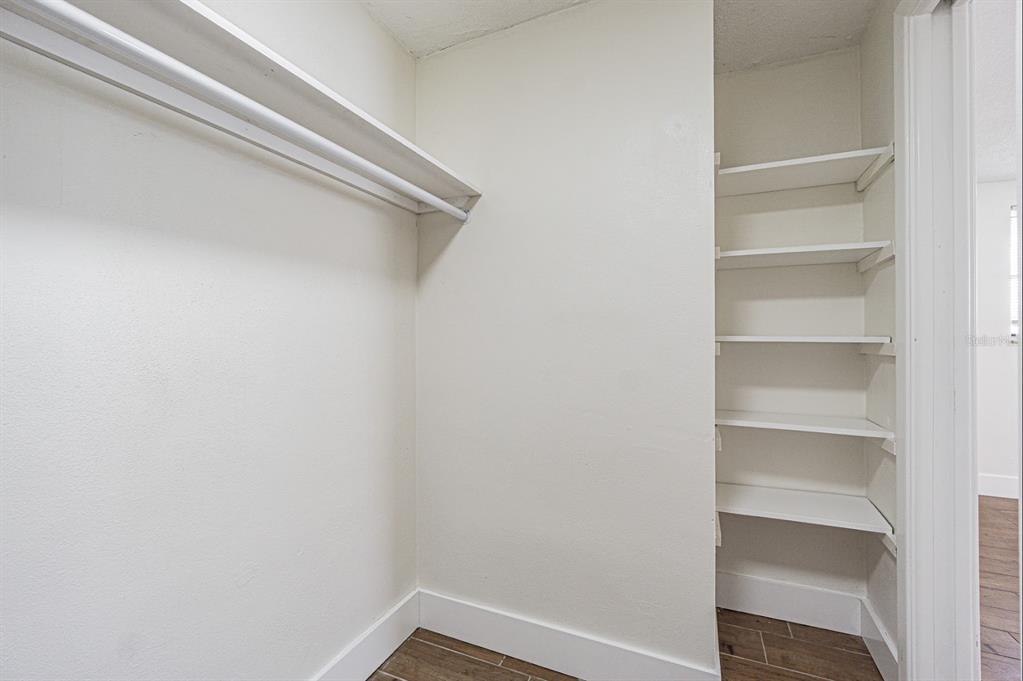 5631 Riddle Road Holiday, FL 34690 - Photo 22 of 27 a view of a room with shelf