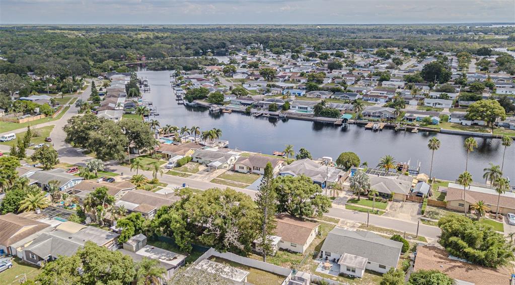 5631 Riddle Road Holiday, FL 34690 - Photo 27 of 27 an aerial view of a house with a lake view