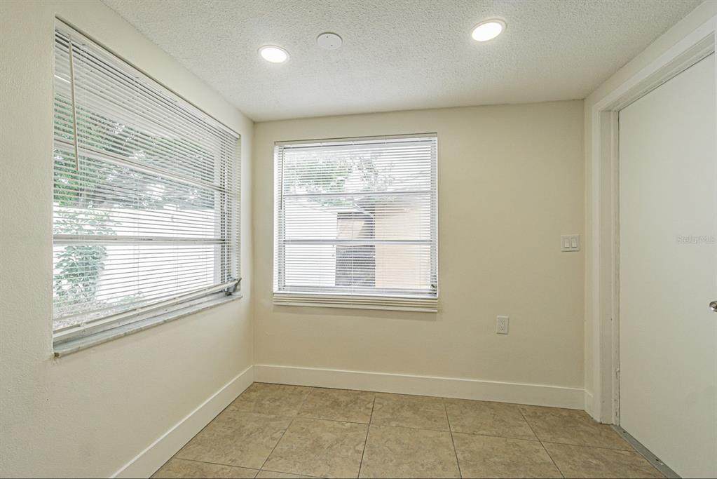 5631 Riddle Road Holiday, FL 34690 - Photo 9 of 27 an empty room with a window