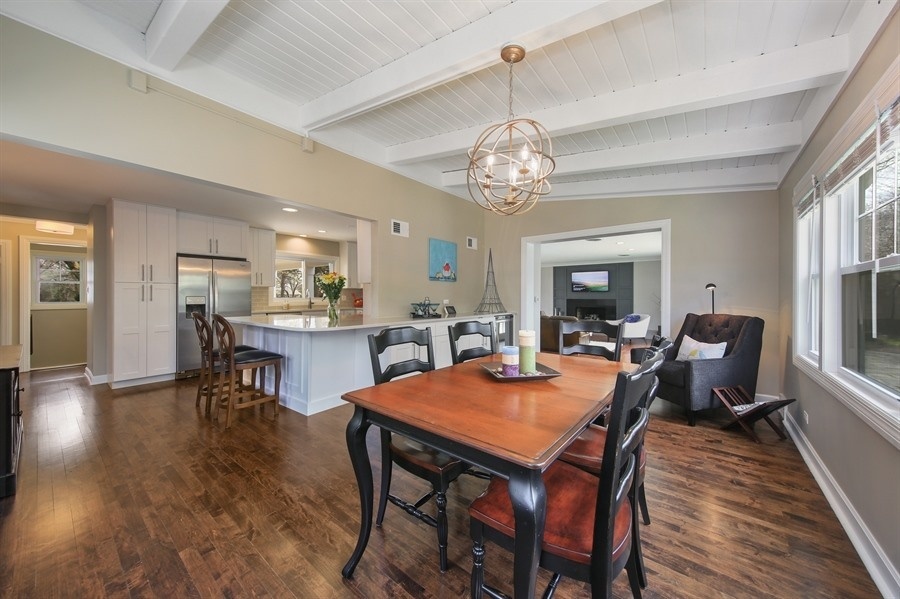 906 South County Line Road Hinsdale, IL 60521 - Photo 11 of 44 a view of a dining room with furniture window and wooden floor