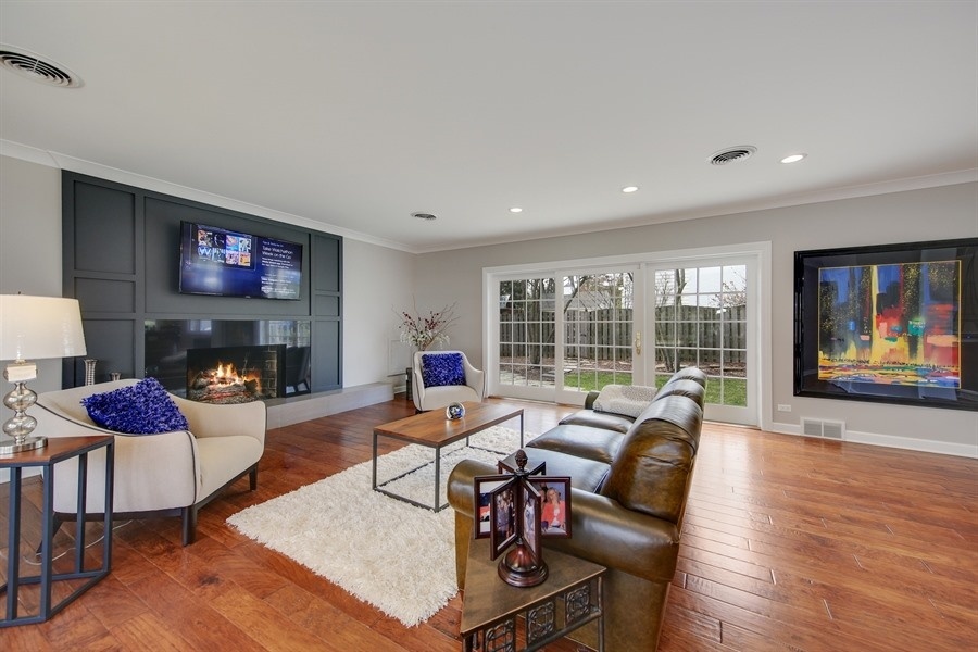 906 South County Line Road Hinsdale, IL 60521 - Photo 15 of 44 a living room with furniture fireplace and a large window