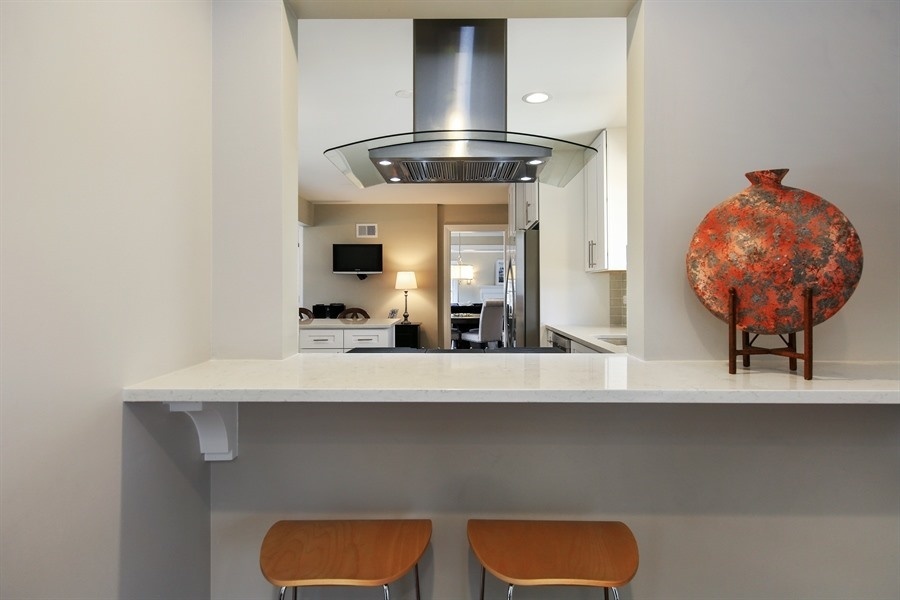 906 South County Line Road Hinsdale, IL 60521 - Photo 18 of 44 a view of dining room with furniture and chandelier