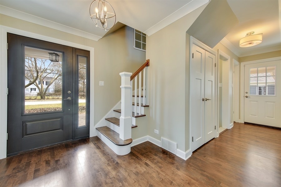 906 South County Line Road Hinsdale, IL 60521 - Photo 3 of 44 wooden floor in an empty room with a window